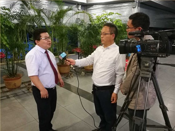 河南濟源電視臺《零距離》欄目組采訪數碼彩業務精英